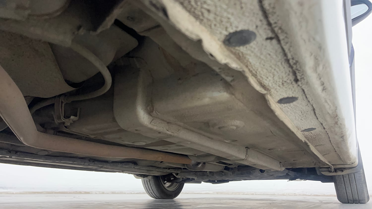 Used 2014 Hyundai Grand i10 Asta AT 1.2 Kappa VTVT Petrol Automatic extra REAR RIGHT UNDERBODY VIEW