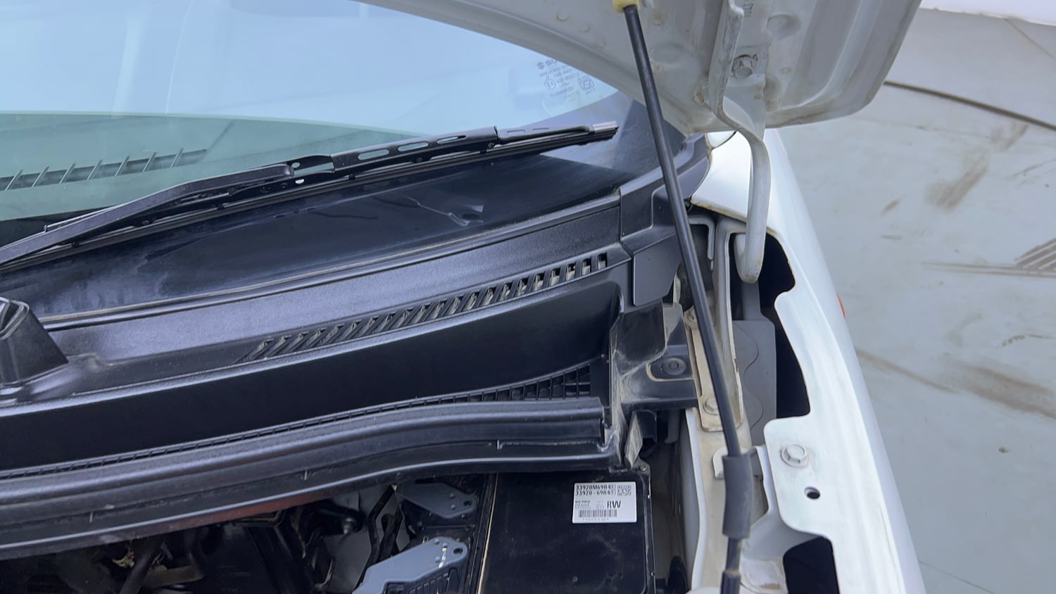 Used 2021 Maruti Suzuki Wagon R 1.0 VXi 1.0 AMT Petrol Automatic engine ENGINE LEFT SIDE HINGE & APRON VIEW