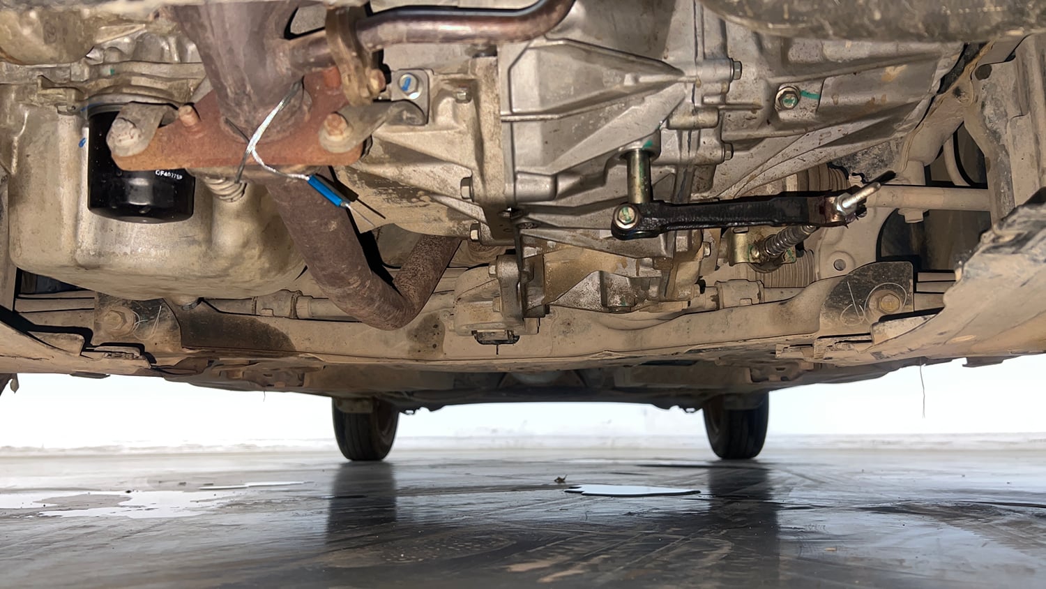 Used 2022 Maruti Suzuki Swift VXi Petrol Manual extra FRONT LEFT UNDERBODY VIEW