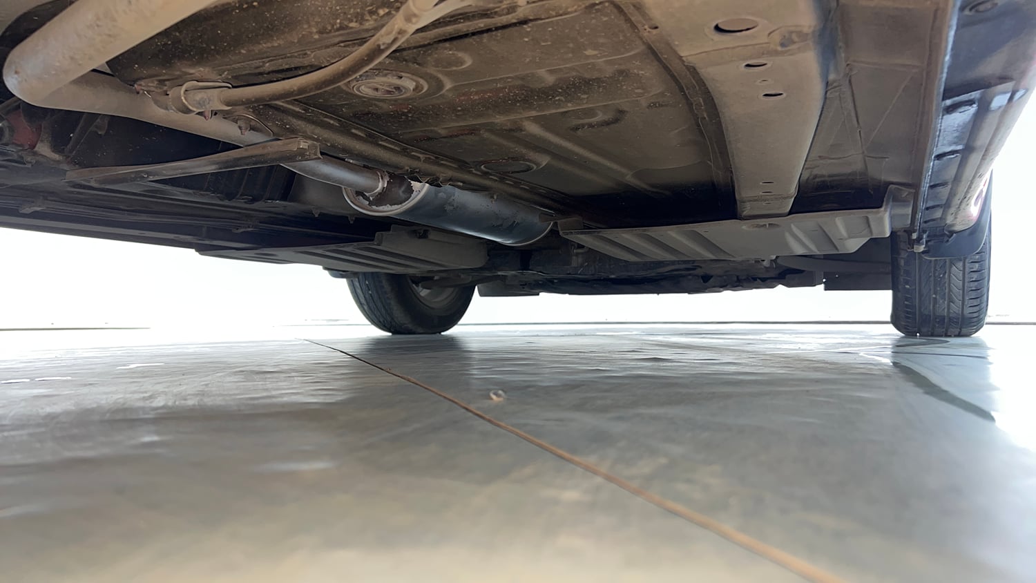 Used 2023 Maruti Suzuki Swift ZXi Plus AMT Dual Tone Petrol Automatic extra REAR RIGHT UNDERBODY VIEW