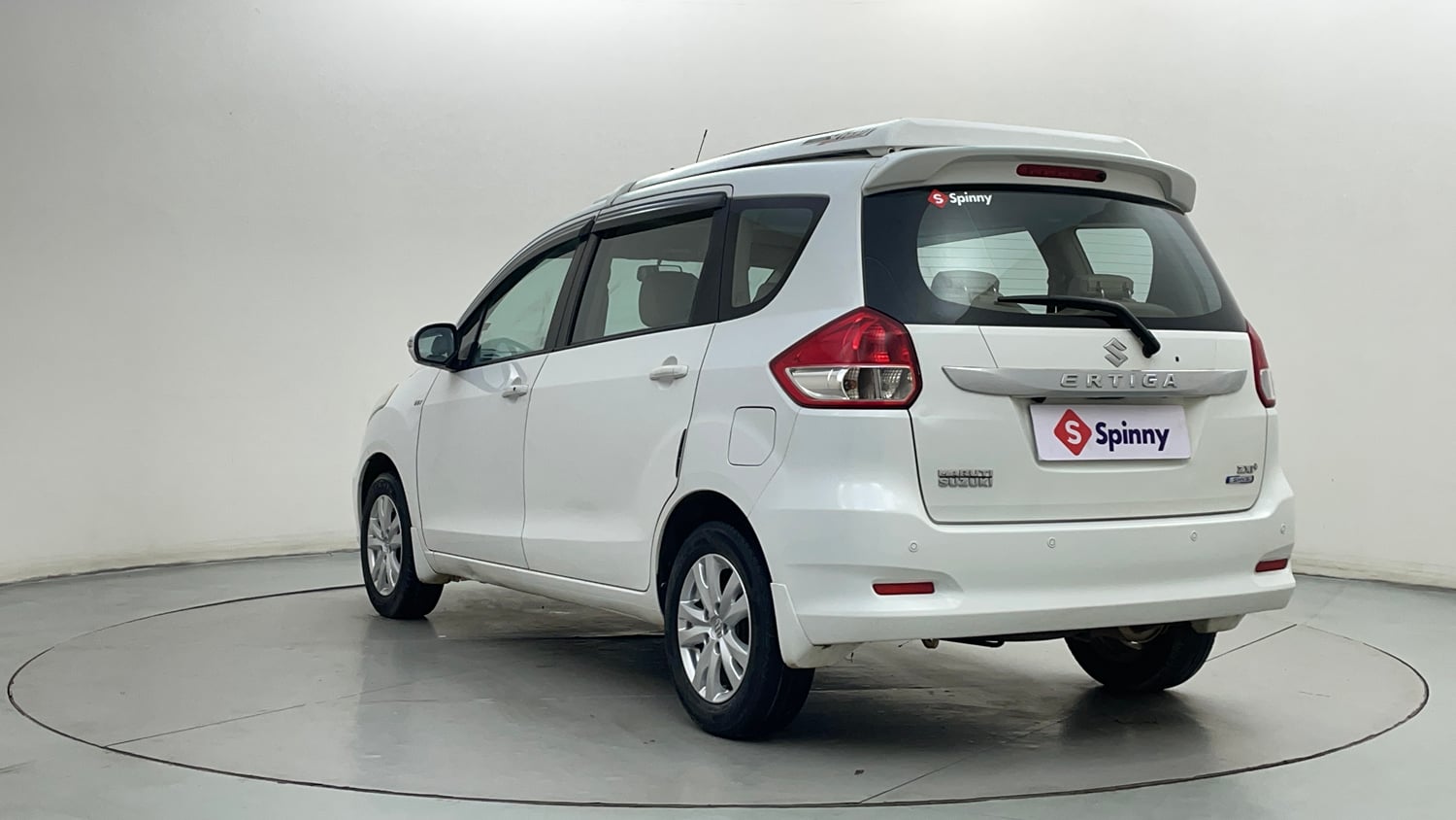 Used 2016 Maruti Suzuki Ertiga ZXI+ Petrol Manual exterior LEFT REAR CORNER VIEW