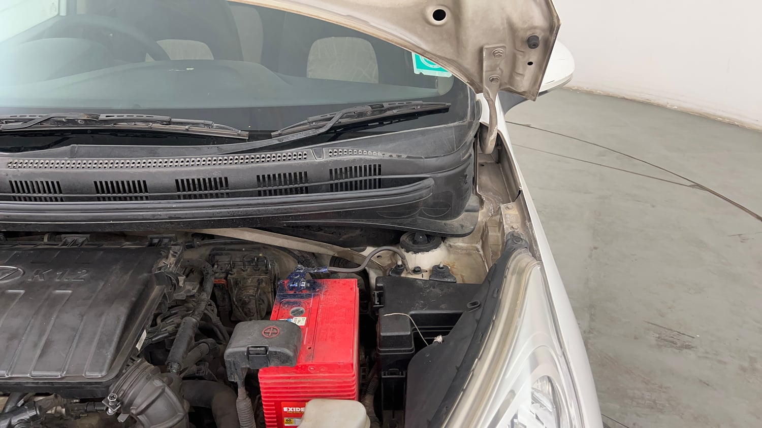 Used 2014 Hyundai Grand i10 Asta 1.2 Kappa VTVT (O) Petrol Manual engine ENGINE LEFT SIDE HINGE & APRON VIEW