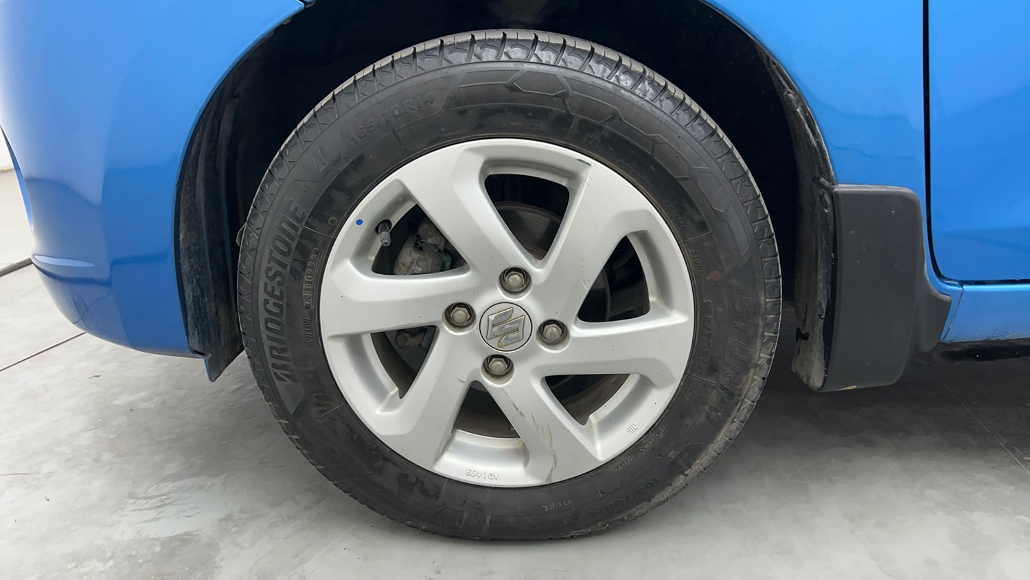 Used 2015 Maruti Suzuki Celerio ZXi Opt Petrol Manual tyres LEFT FRONT TYRE RIM VIEW