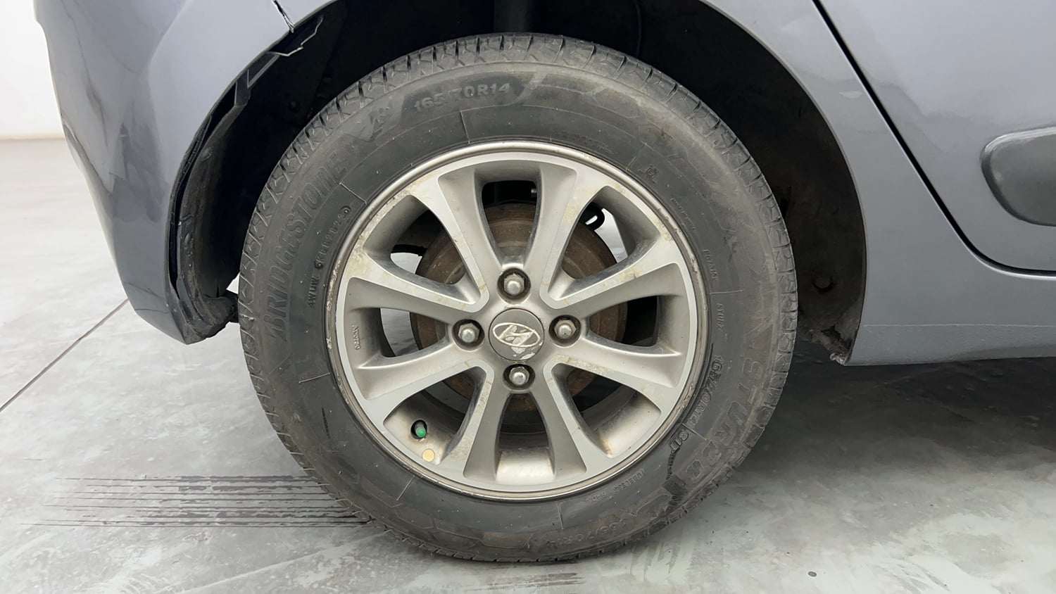 Used 2014 Hyundai Grand i10 Asta 1.2 Kappa VTVT (O) Petrol Manual tyres RIGHT REAR TYRE RIM VIEW