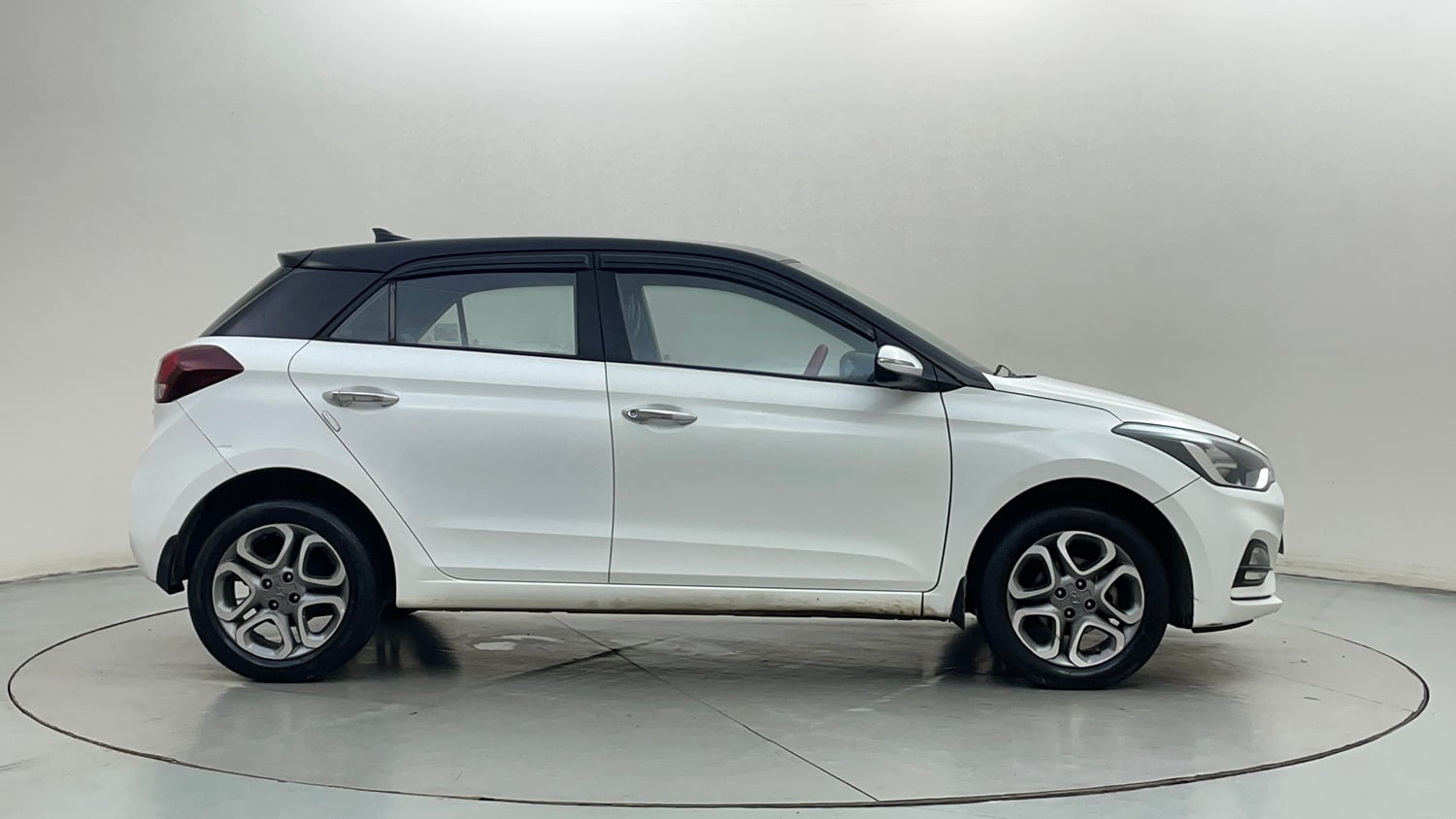 Used 2019 Hyundai Elite i20 Asta 1.2 Dual Tone Petrol Manual exterior RIGHT SIDE VIEW