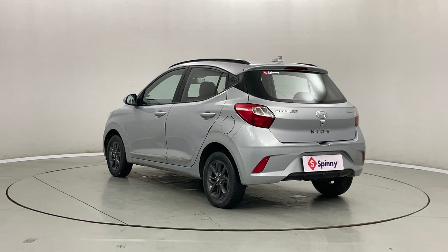 Used 2022 Hyundai Grand i10 Nios Sportz AMT 1.2 Kappa VTVT Petrol Automatic exterior LEFT REAR CORNER VIEW