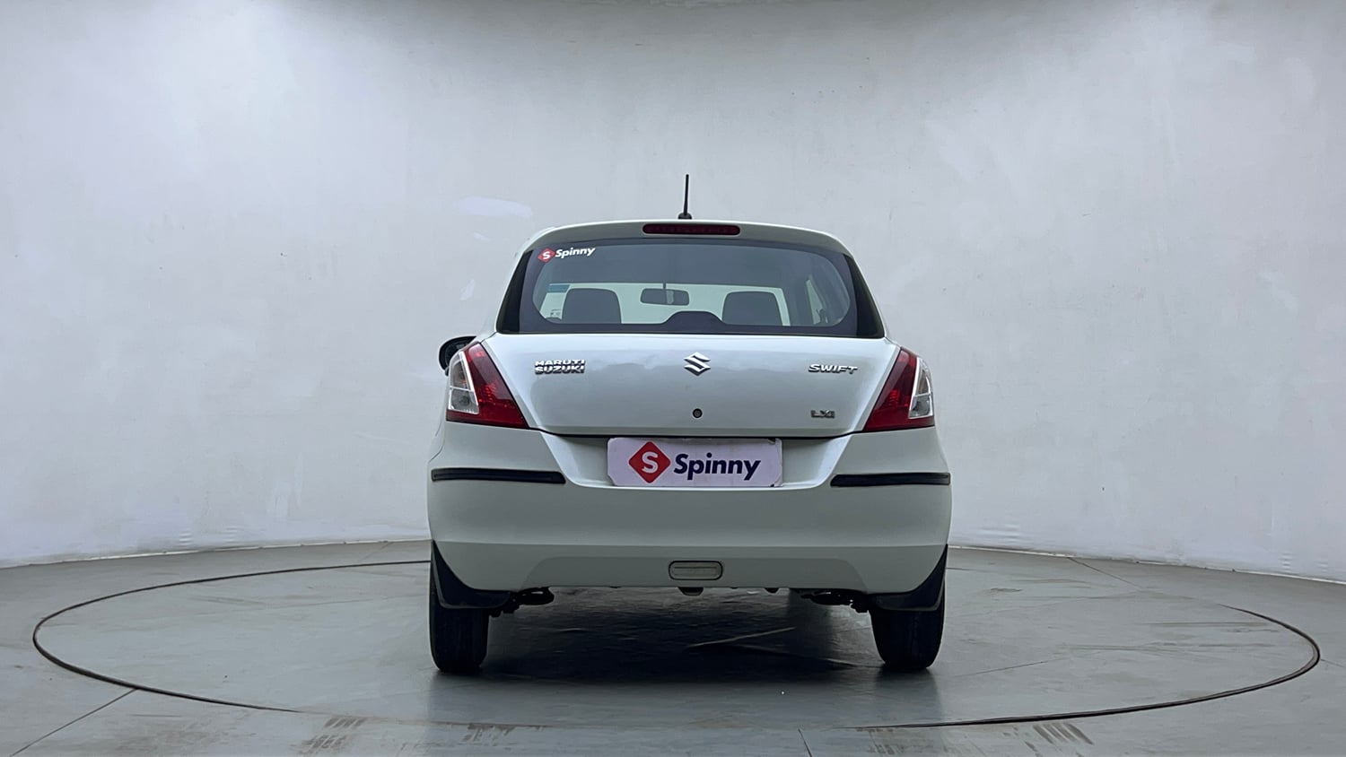 Used 2013 Maruti Suzuki Swift LXi Petrol Manual exterior BACK VIEW