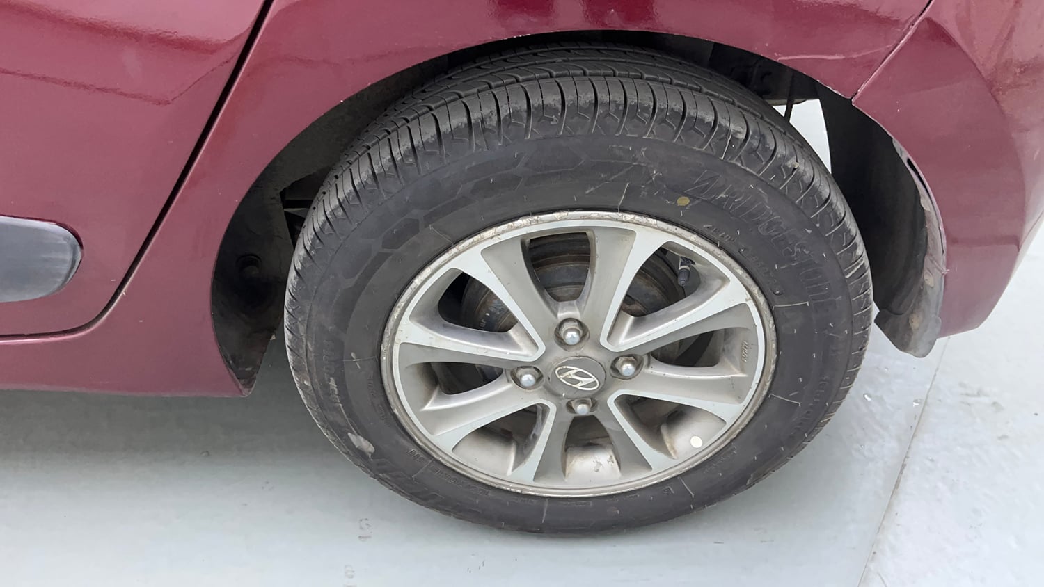 Used 2014 Hyundai Grand i10 Asta 1.2 Kappa VTVT Petrol Manual tyres LEFT REAR TYRE RIM VIEW