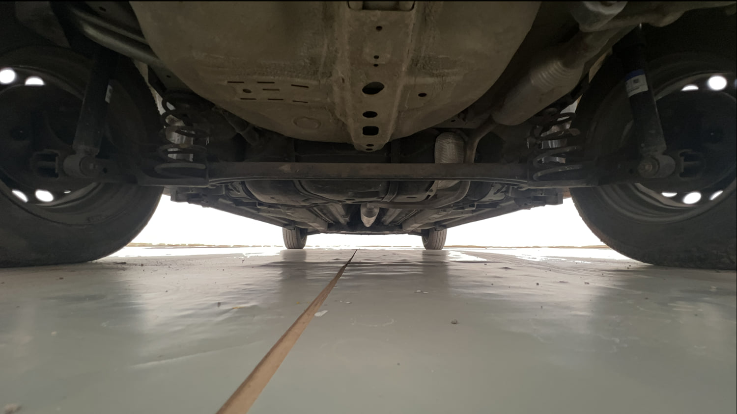 Used 2017 Maruti Suzuki Swift Lxi (O) Petrol Manual extra REAR UNDERBODY VIEW (TAKEN FROM REAR)