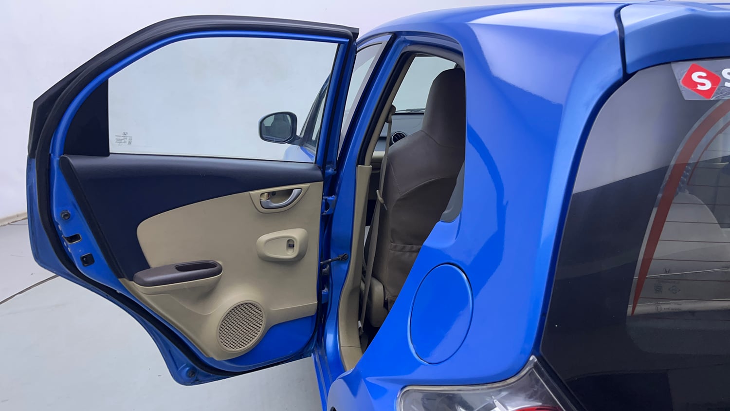 Used 2013 Honda Brio V MT Petrol Manual interior LEFT REAR DOOR OPEN VIEW