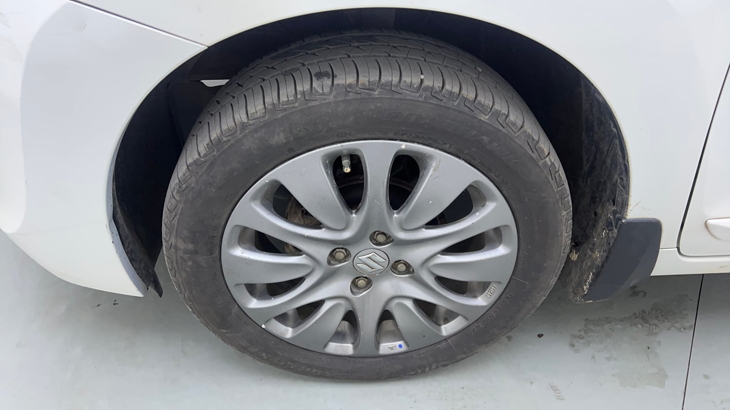 Used 2018 Maruti Suzuki Baleno Zeta 1.2 Petrol Manual tyres LEFT FRONT TYRE RIM VIEW