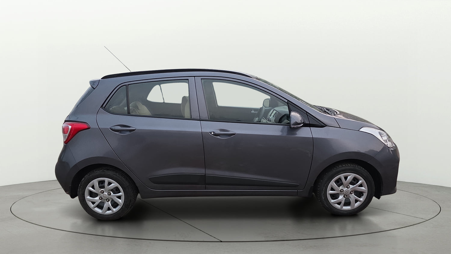 Used 2018 Hyundai Grand i10 Sportz (O) 1.2 Kappa VTVT Petrol Manual exterior RIGHT SIDE VIEW