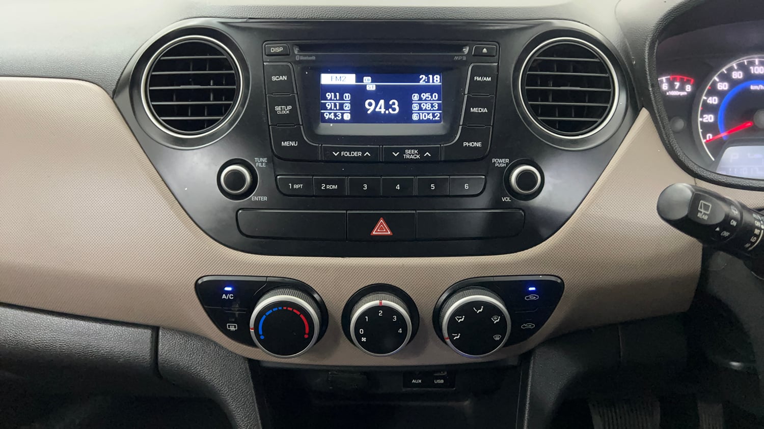 Used 2014 Hyundai Grand i10 Asta AT 1.2 Kappa VTVT Petrol Automatic interior MUSIC SYSTEM & AC CONTROL VIEW