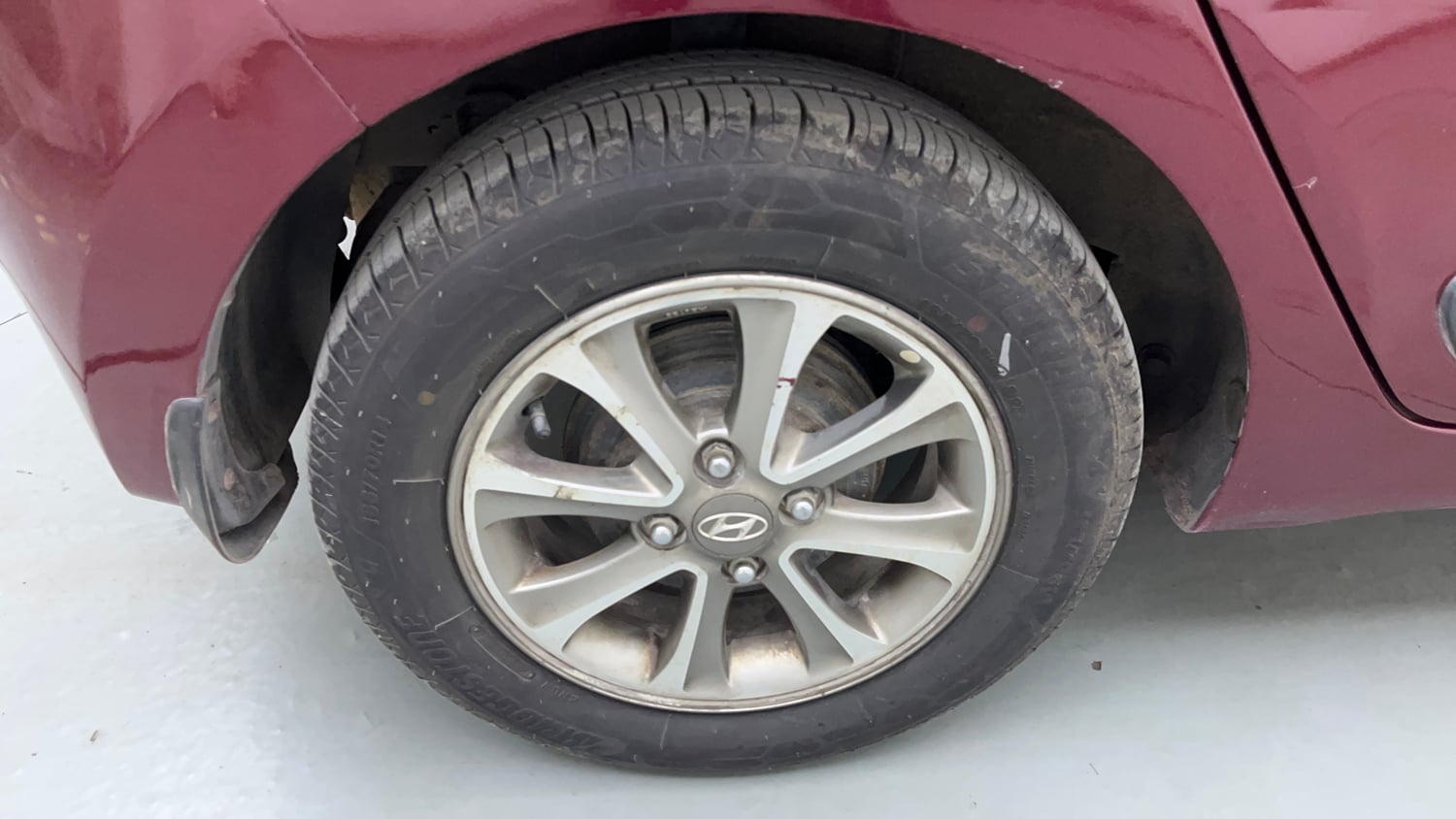 Used 2014 Hyundai Grand i10 Asta 1.2 Kappa VTVT Petrol Manual tyres RIGHT REAR TYRE RIM VIEW