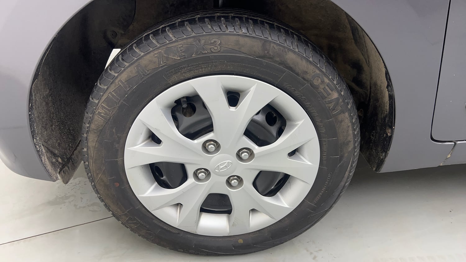 Used 2017 Hyundai Grand i10 Sportz 1.2 Kappa VTVT Petrol Manual tyres LEFT FRONT TYRE RIM VIEW