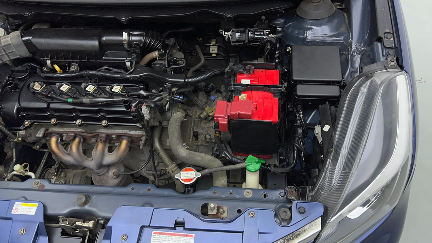 Used 2021 Maruti Suzuki Baleno Delta Petrol Manual engine ENGINE LEFT SIDE VIEW