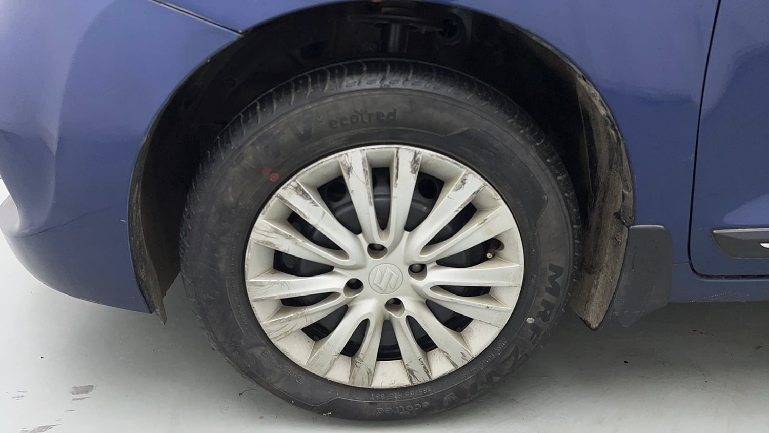 Used 2021 Maruti Suzuki Baleno Delta Petrol Manual tyres LEFT FRONT TYRE RIM VIEW
