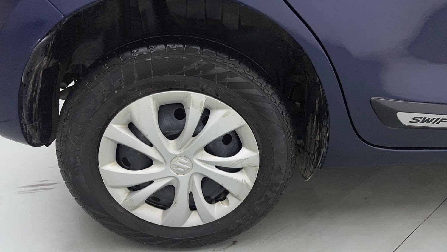 Used 2022 Maruti Suzuki Swift VXi Petrol Manual tyres RIGHT REAR TYRE RIM VIEW