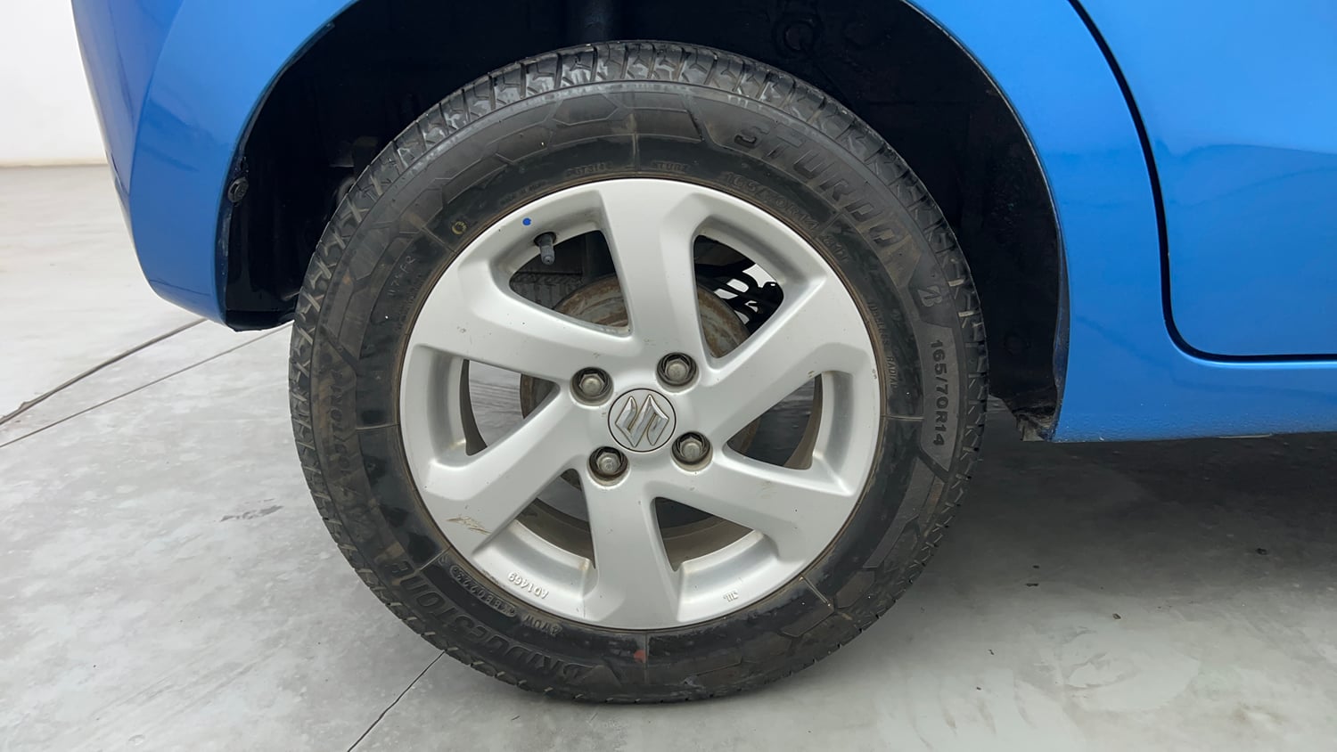 Used 2015 Maruti Suzuki Celerio ZXi Opt Petrol Manual tyres RIGHT REAR TYRE RIM VIEW