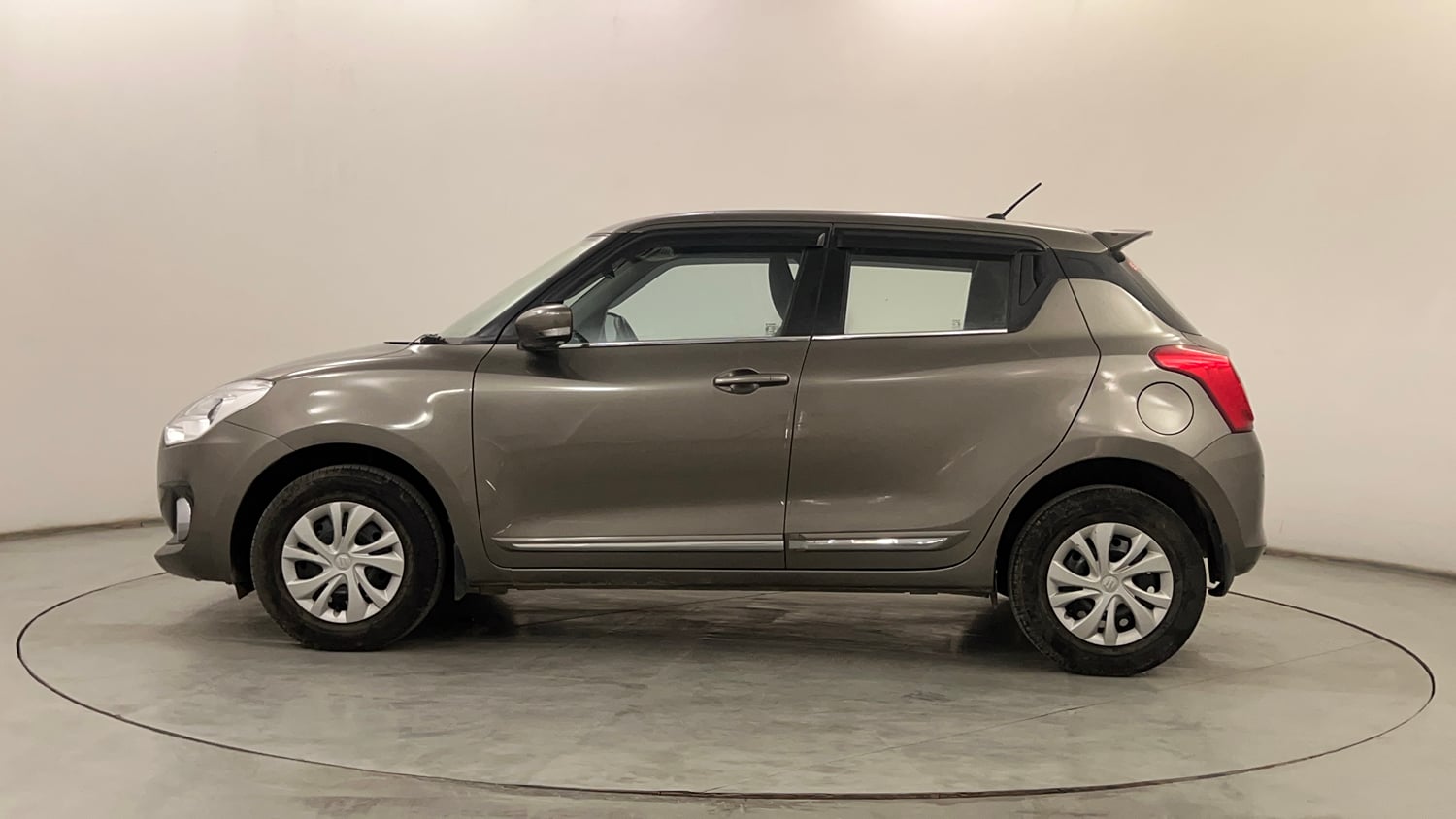 Used 2021 Maruti Suzuki Swift VXi Petrol Manual exterior LEFT SIDE VIEW