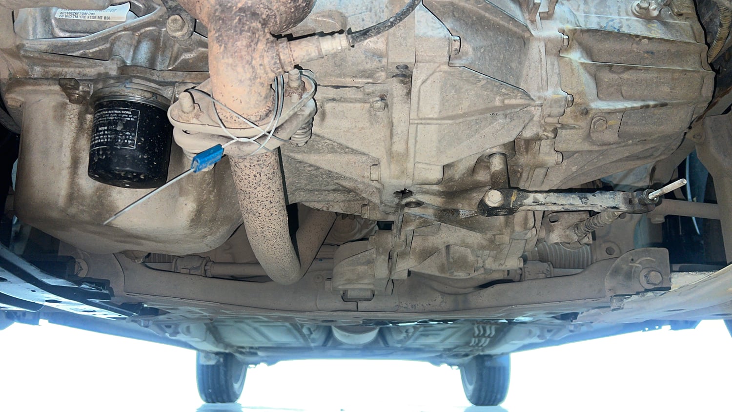 Used 2021 Maruti Suzuki Baleno Zeta Petrol Manual extra FRONT LEFT UNDERBODY VIEW