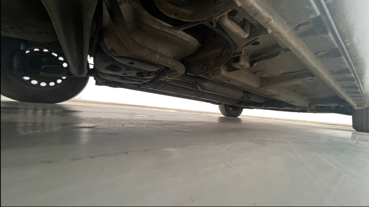 Used 2017 Maruti Suzuki Swift Lxi (O) Petrol Manual extra REAR RIGHT UNDERBODY VIEW