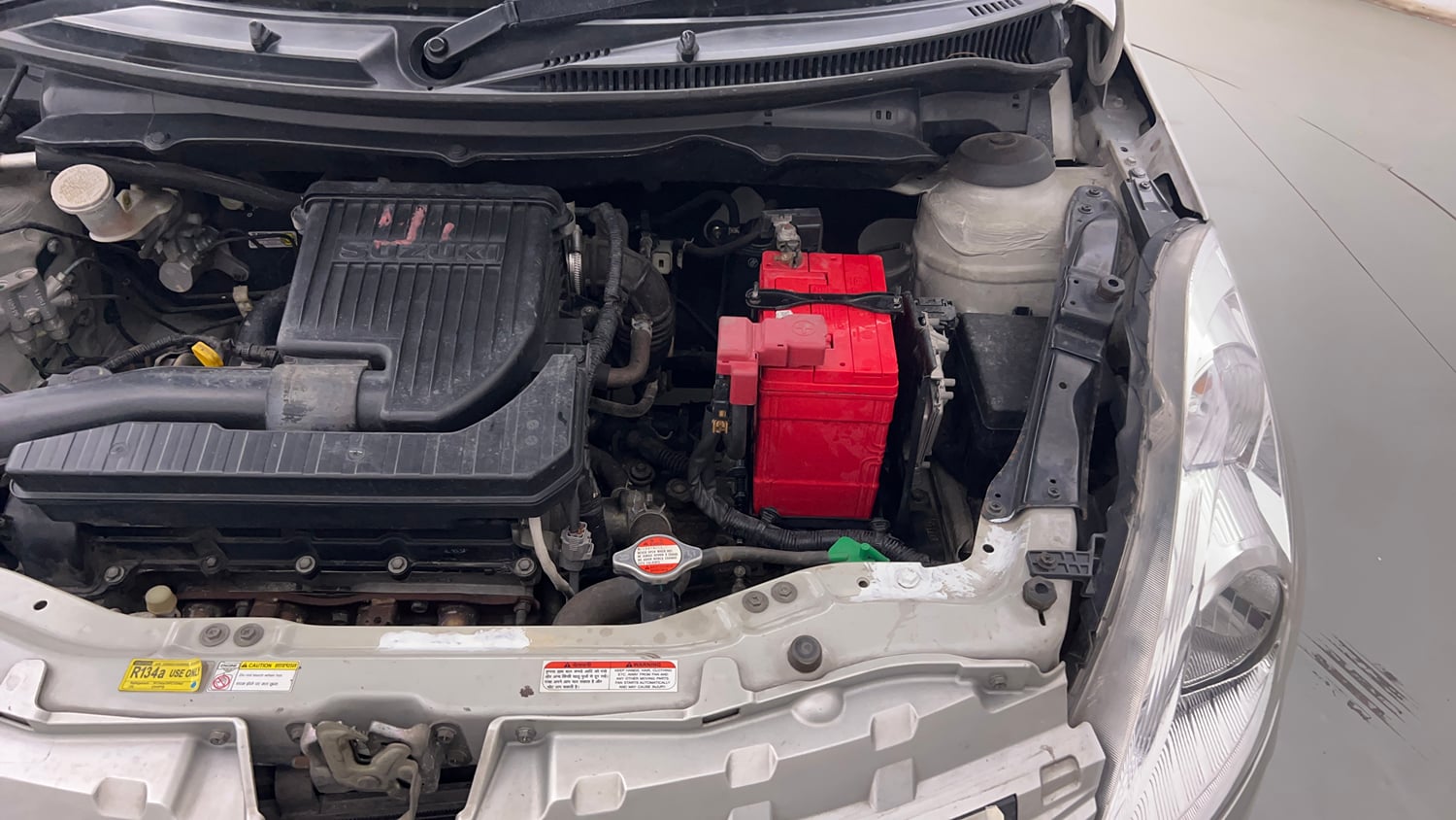 Used 2017 Maruti Suzuki Swift Lxi (O) Petrol Manual engine ENGINE LEFT SIDE VIEW