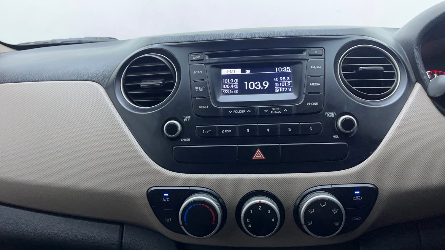 Used 2014 Hyundai Grand i10 Asta 1.2 Kappa VTVT Petrol Manual interior MUSIC SYSTEM & AC CONTROL VIEW
