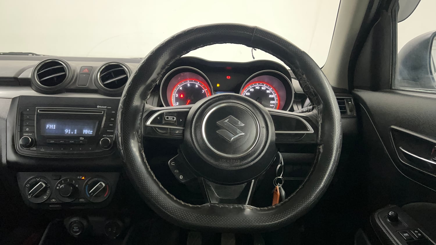 Used 2021 Maruti Suzuki Swift VXi Petrol Manual interior STEERING VIEW