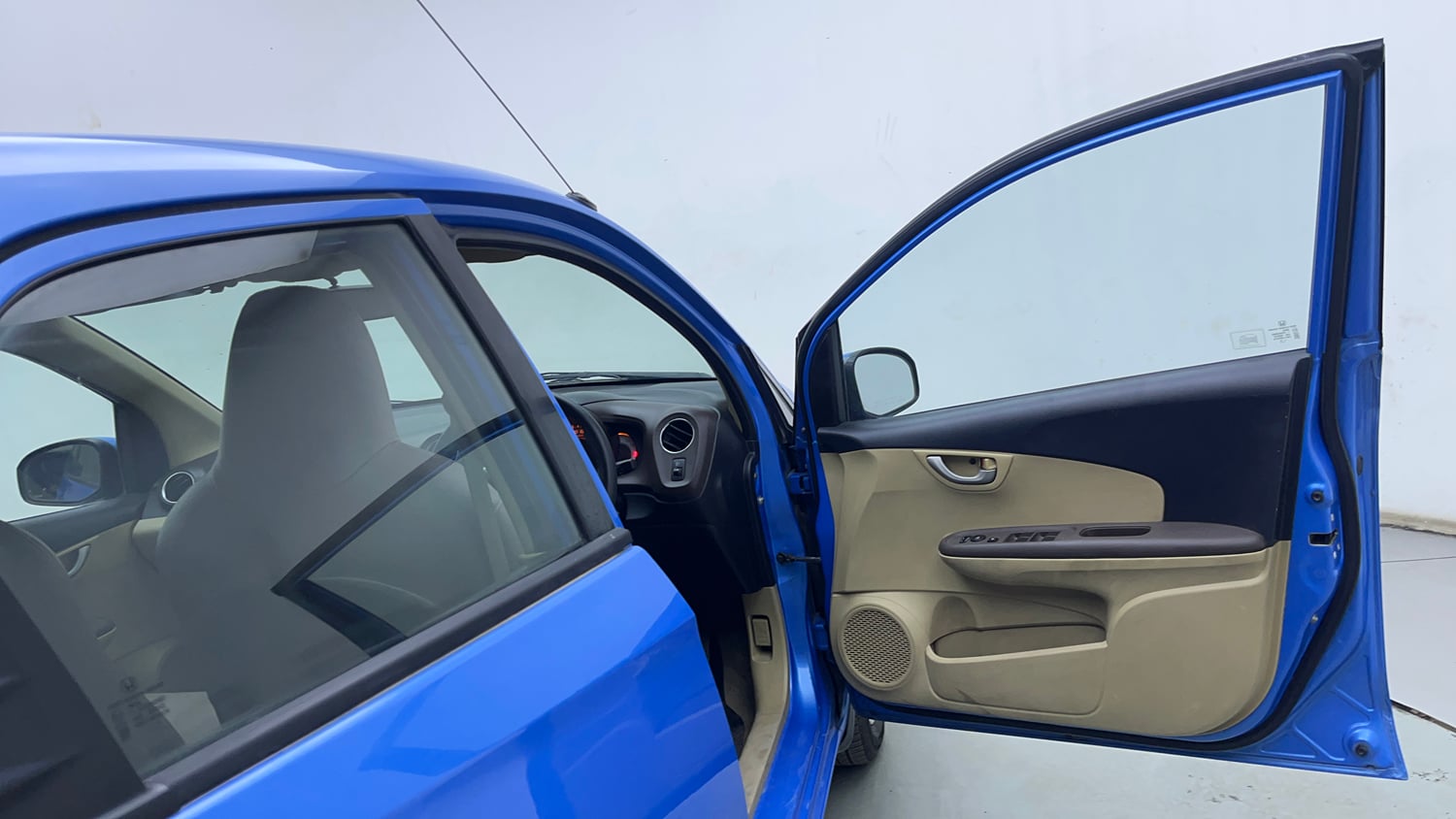 Used 2013 Honda Brio V MT Petrol Manual interior RIGHT FRONT DOOR OPEN VIEW