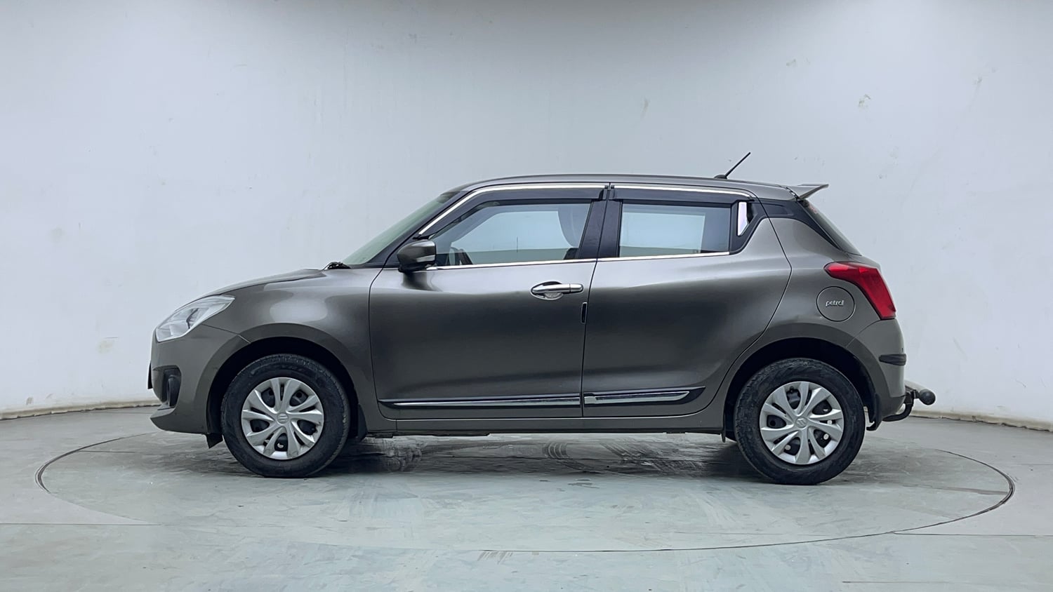 Used 2022 Maruti Suzuki Swift VXi Petrol Manual exterior LEFT SIDE VIEW