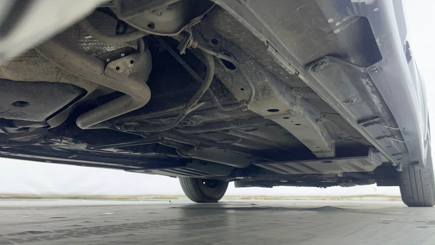 Used 2021 Maruti Suzuki Swift VXi Petrol Manual extra REAR RIGHT UNDERBODY VIEW