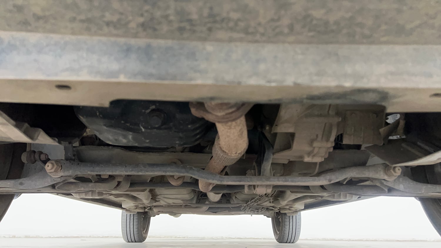 Used 2024 Tata Tigor XZA iCNG Cng Automatic extra FRONT LEFT UNDERBODY VIEW