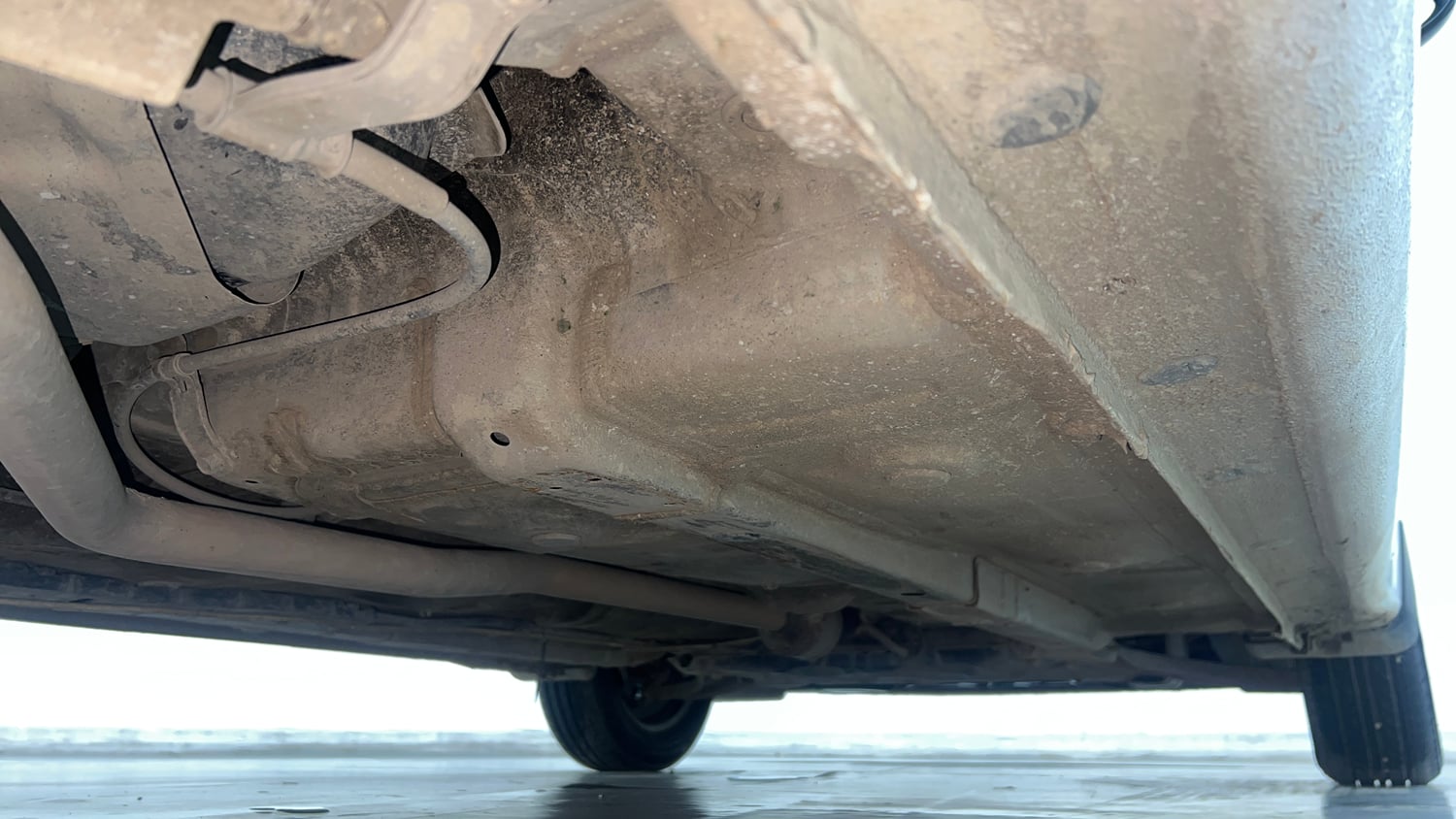 Used 2024 Hyundai Grand i10 Nios Magna 1.2 Kappa Petrol+CNG (Outside Fitted) Cng Manual extra REAR RIGHT UNDERBODY VIEW