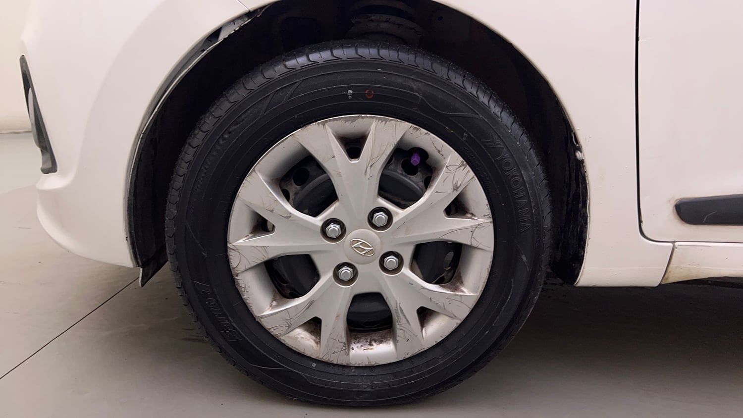 Used 2014 Hyundai Grand i10 Sportz 1.2 Kappa VTVT Petrol Manual tyres LEFT FRONT TYRE RIM VIEW