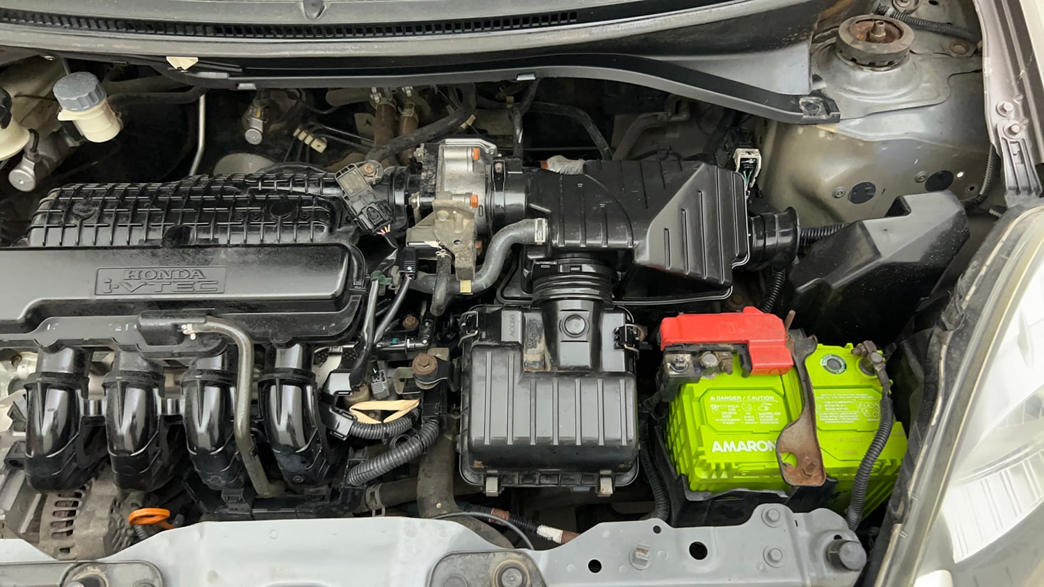 Used 2013 Honda Amaze 1.2 S i-VTEC Petrol Manual engine ENGINE LEFT SIDE VIEW