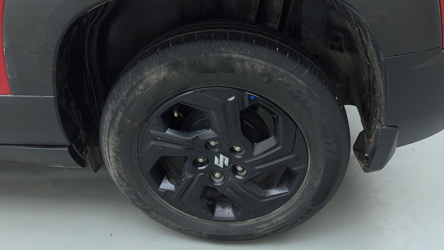 Used 2023 Maruti Suzuki Brezza Zxi Dual Tone Petrol Manual tyres LEFT REAR TYRE RIM VIEW