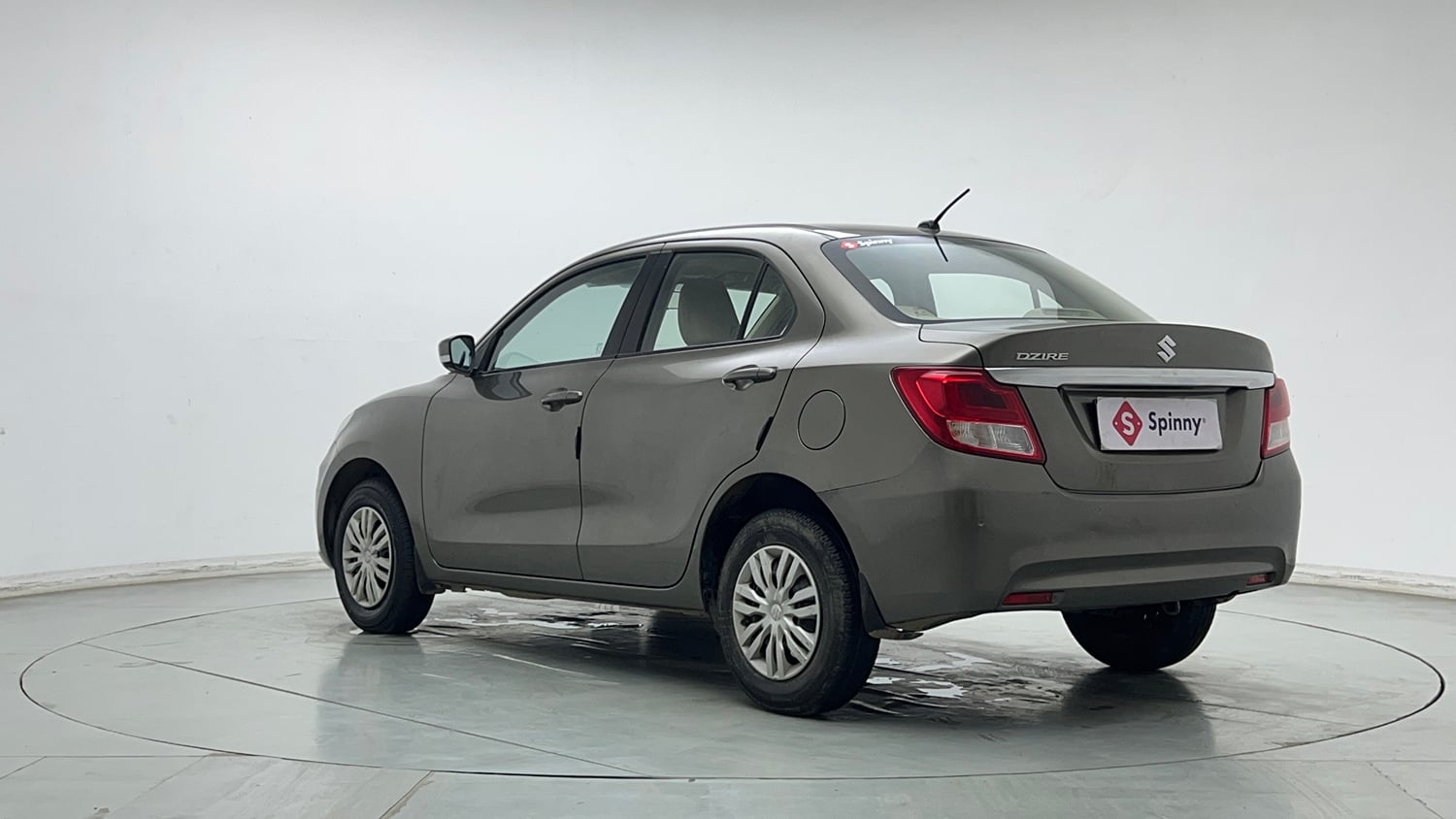 Used 2022 Maruti Suzuki Dzire VXi Petrol Manual exterior LEFT REAR CORNER VIEW