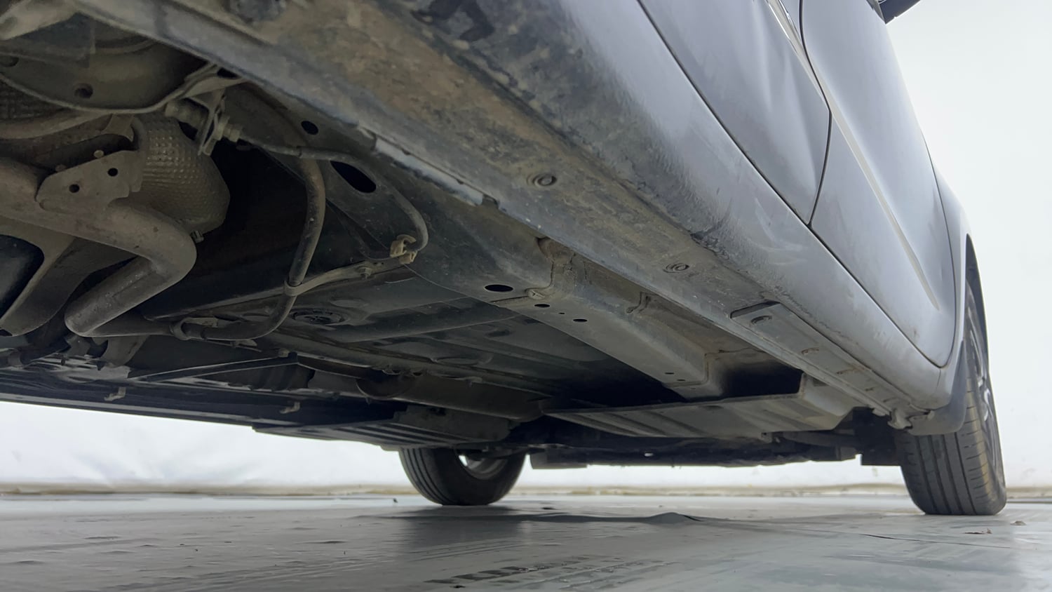 Used 2023 Maruti Suzuki Swift ZXi Plus AMT Petrol Automatic extra REAR RIGHT UNDERBODY VIEW