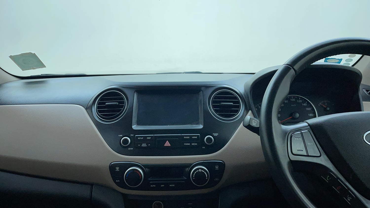 Used 2017 Hyundai Grand i10 Asta 1.2 Kappa VTVT Petrol Manual interior MUSIC SYSTEM & AC CONTROL VIEW