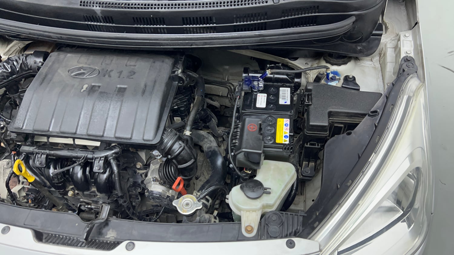 Used 2018 Hyundai Grand i10 Sportz (O) AT 1.2 Kappa VTVT Petrol Automatic engine ENGINE LEFT SIDE VIEW