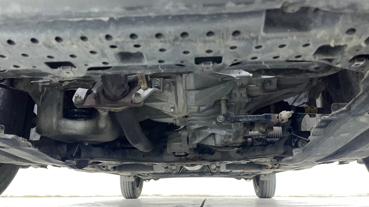 Used 2022 Maruti Suzuki Swift VXi Petrol Manual extra FRONT LEFT UNDERBODY VIEW