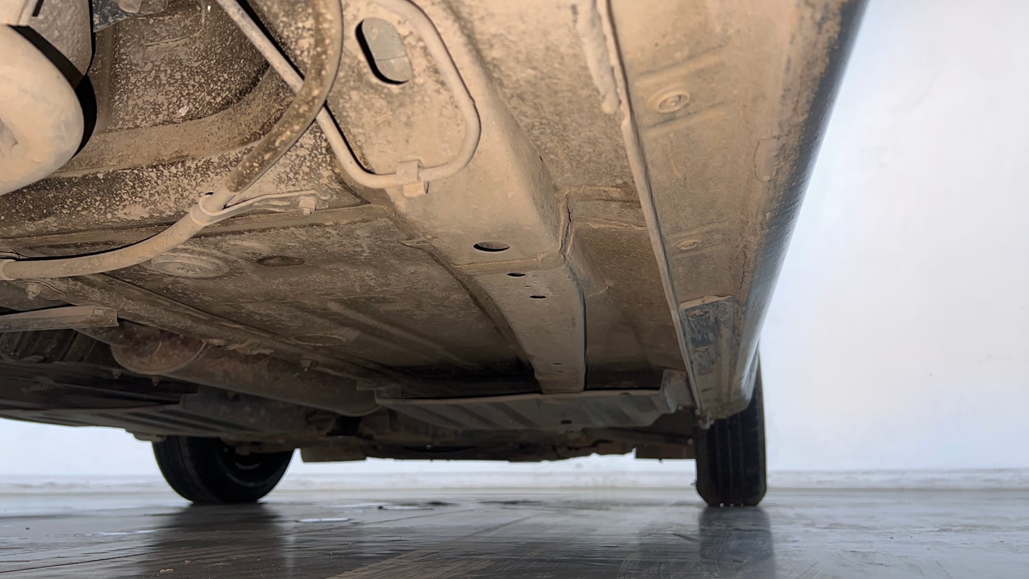 Used 2022 Maruti Suzuki Dzire VXi Petrol Manual extra REAR RIGHT UNDERBODY VIEW