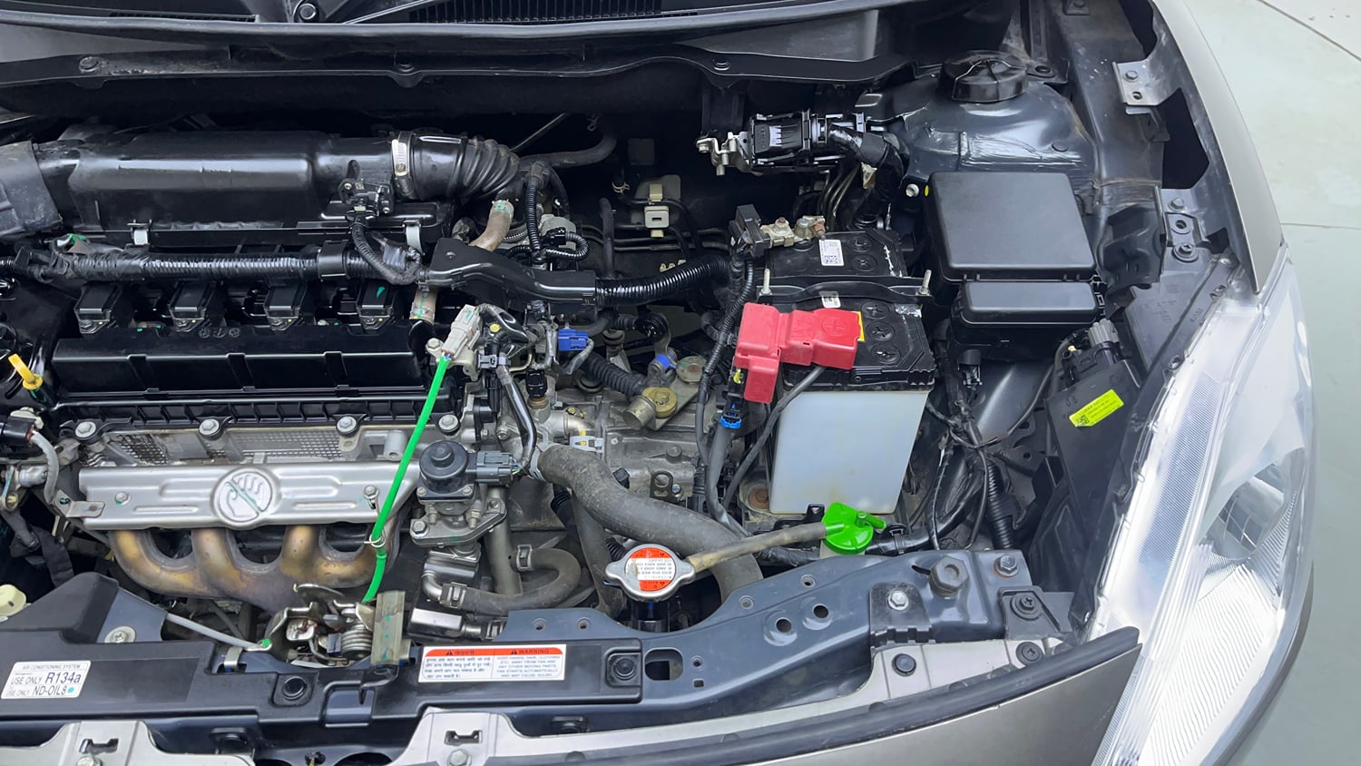 Used 2021 Maruti Suzuki Swift VXi Petrol Manual engine ENGINE LEFT SIDE VIEW