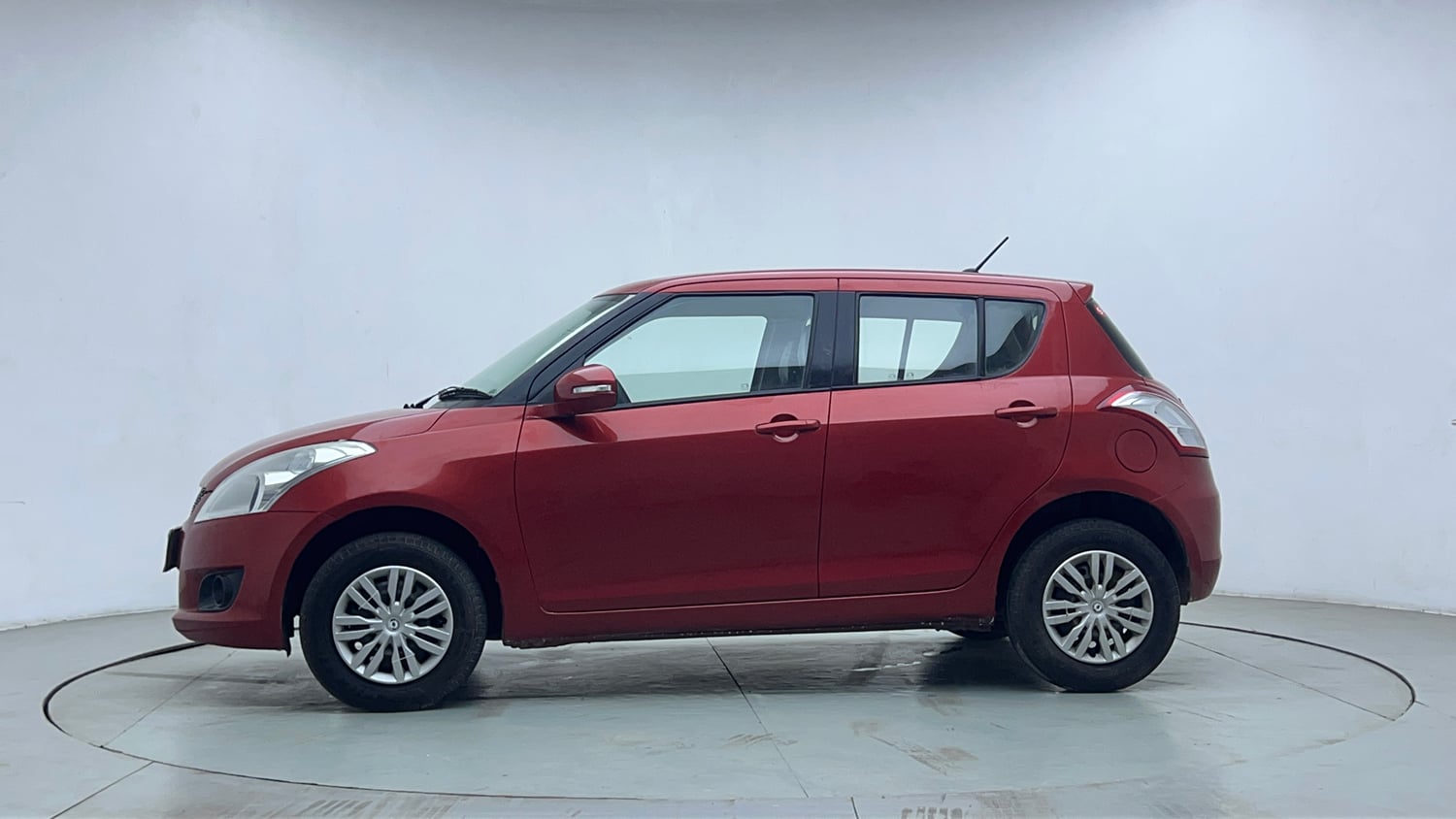 Used 2013 Maruti Suzuki Swift VXi Petrol Manual exterior LEFT SIDE VIEW