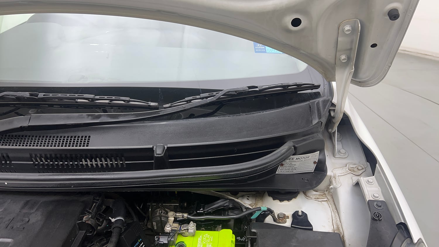 Used 2024 Hyundai Grand i10 Nios Magna 1.2 Kappa Petrol+CNG (Outside Fitted) Cng Manual engine ENGINE LEFT SIDE HINGE & APRON VIEW