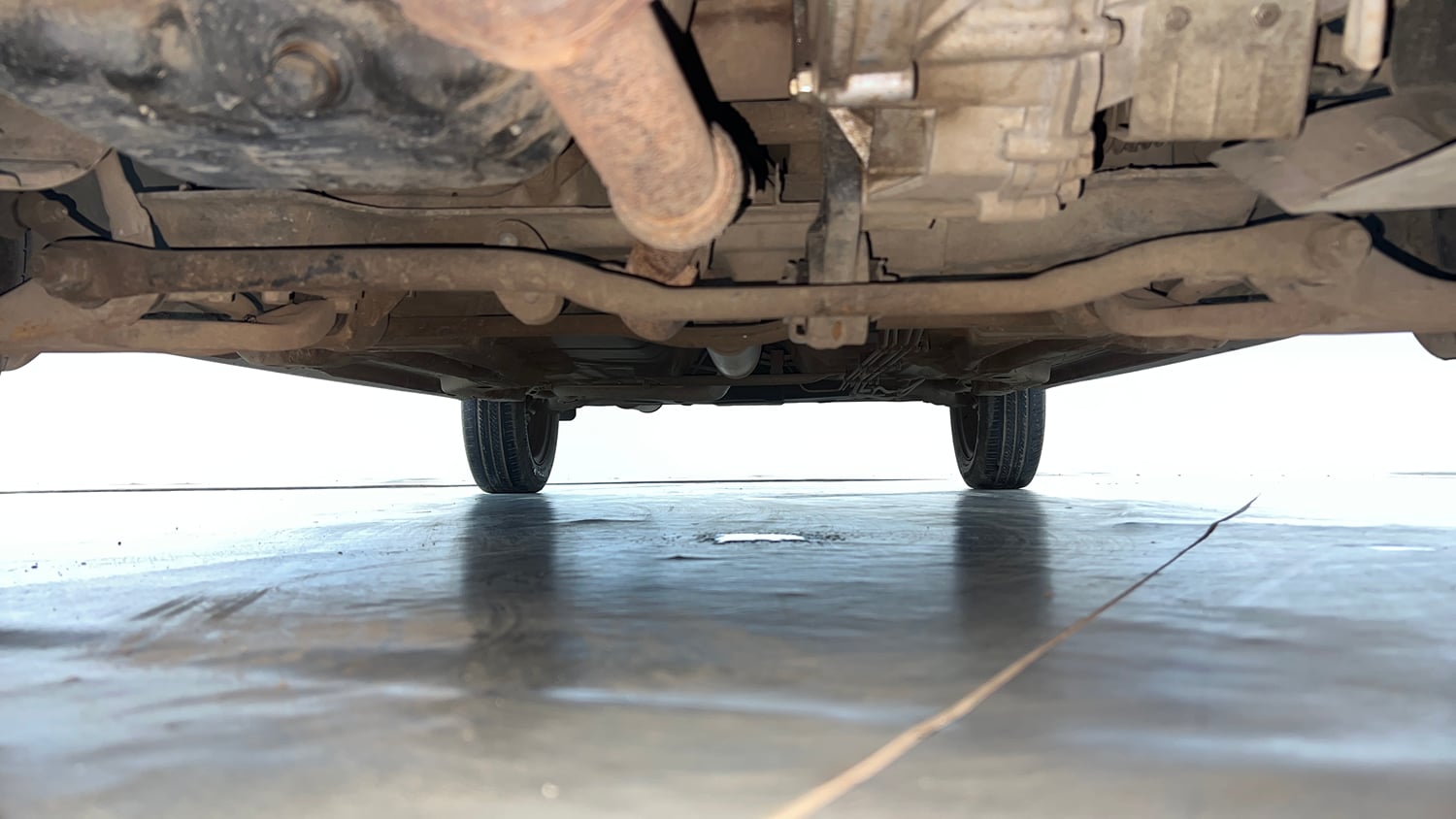 Used 2021 Tata Tigor XMA Petrol Automatic extra FRONT LEFT UNDERBODY VIEW