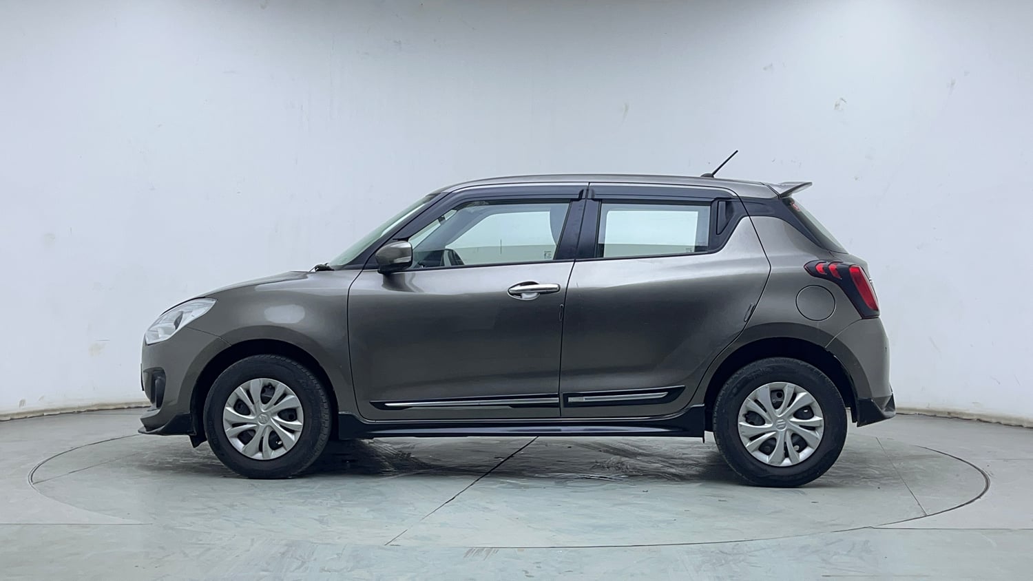 Used 2021 Maruti Suzuki Swift VXi Petrol Manual exterior LEFT SIDE VIEW