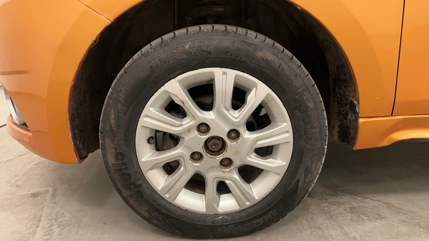 Used 2016 Tata Tiago Revotron XZ Petrol Manual tyres LEFT FRONT TYRE RIM VIEW