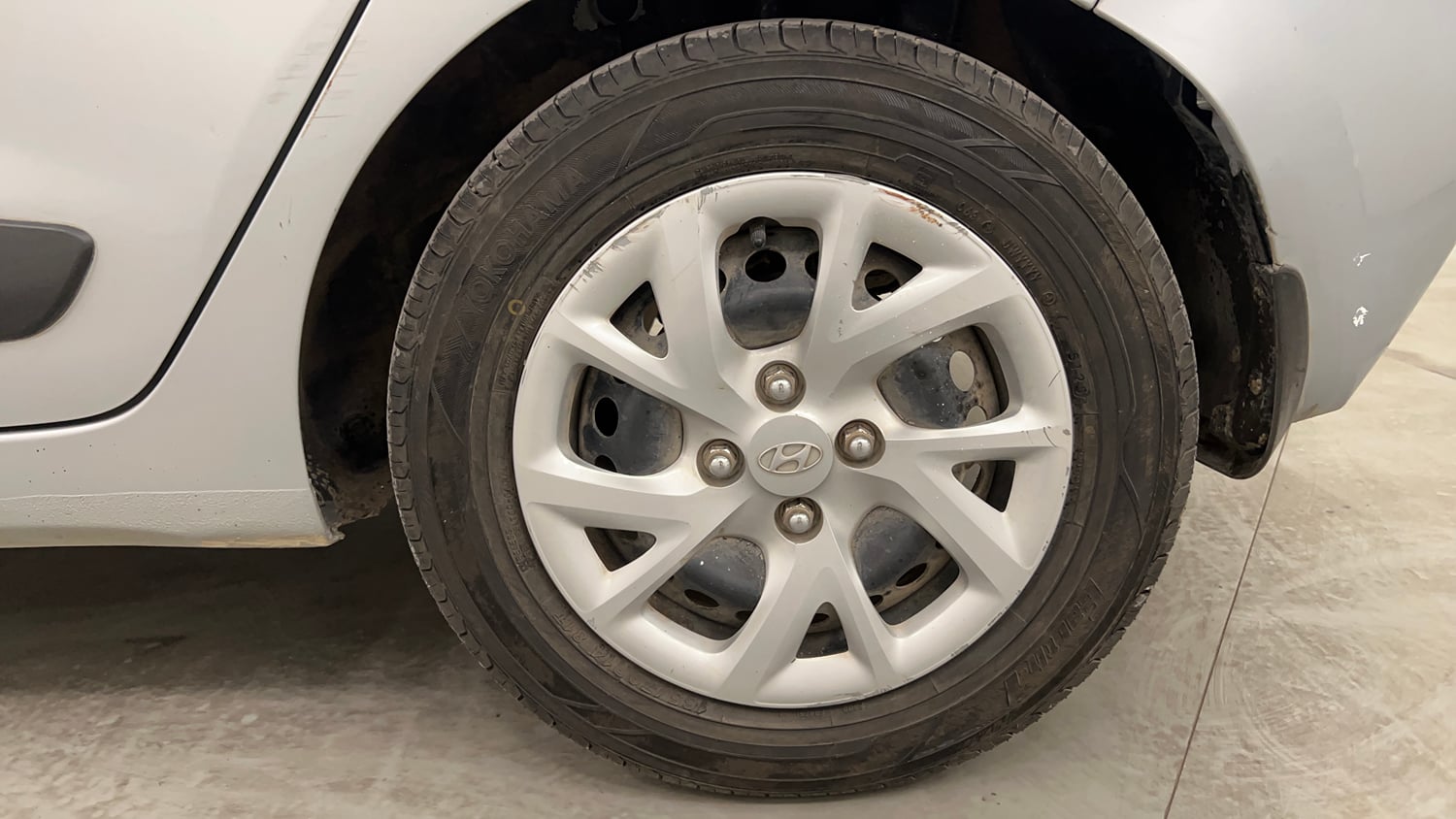 Used 2019 Hyundai Grand i10 Sportz 1.2 Kappa VTVT CNG (Outside Fitted) Cng Manual tyres LEFT REAR TYRE RIM VIEW
